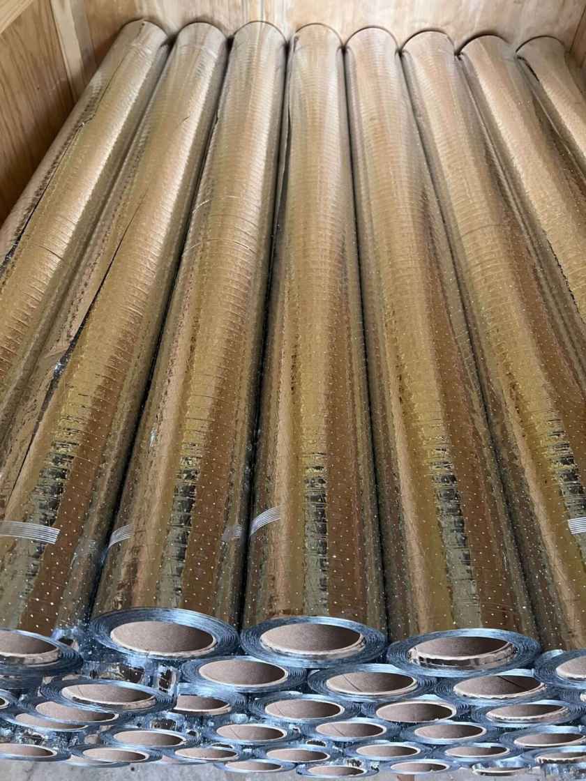 Closeup of neatly stacked ES® RFID Radiant Barrier rolls