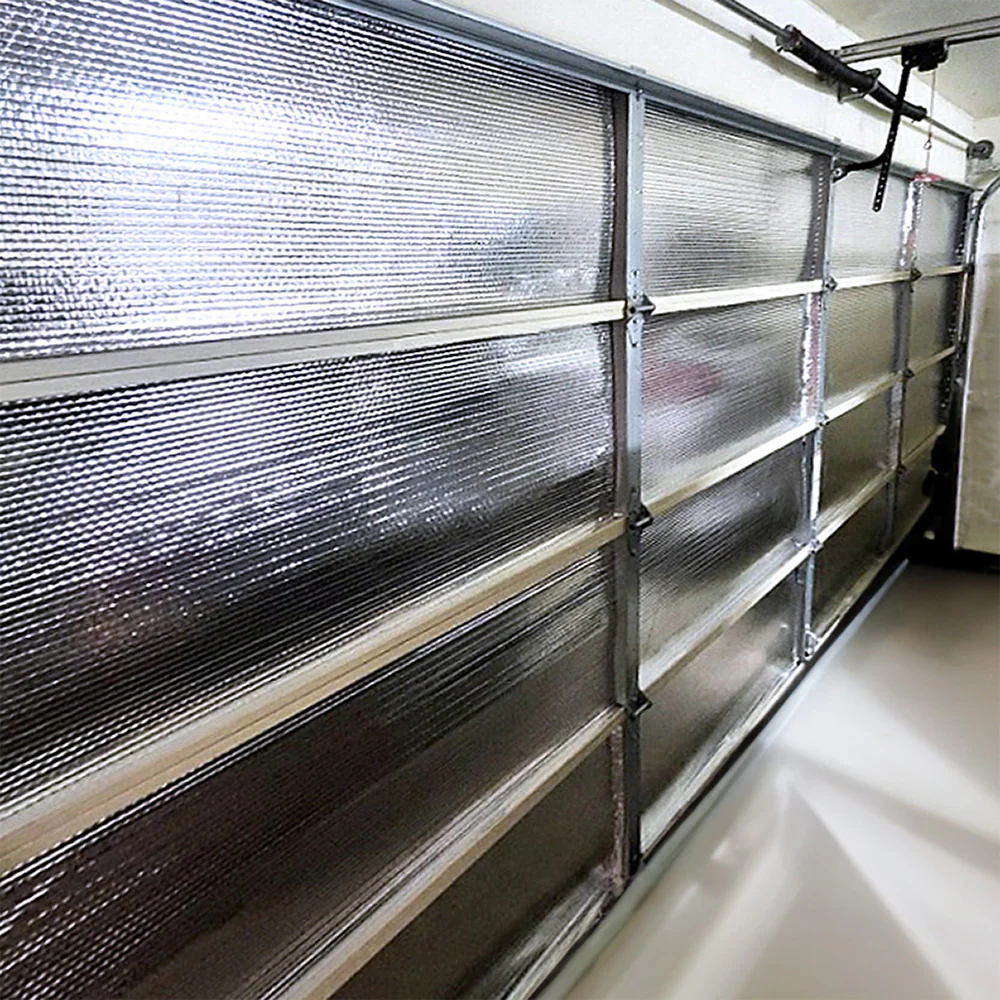 Garage door insulation kit with reflective bubble radiant barrier reducing heat and energy loss