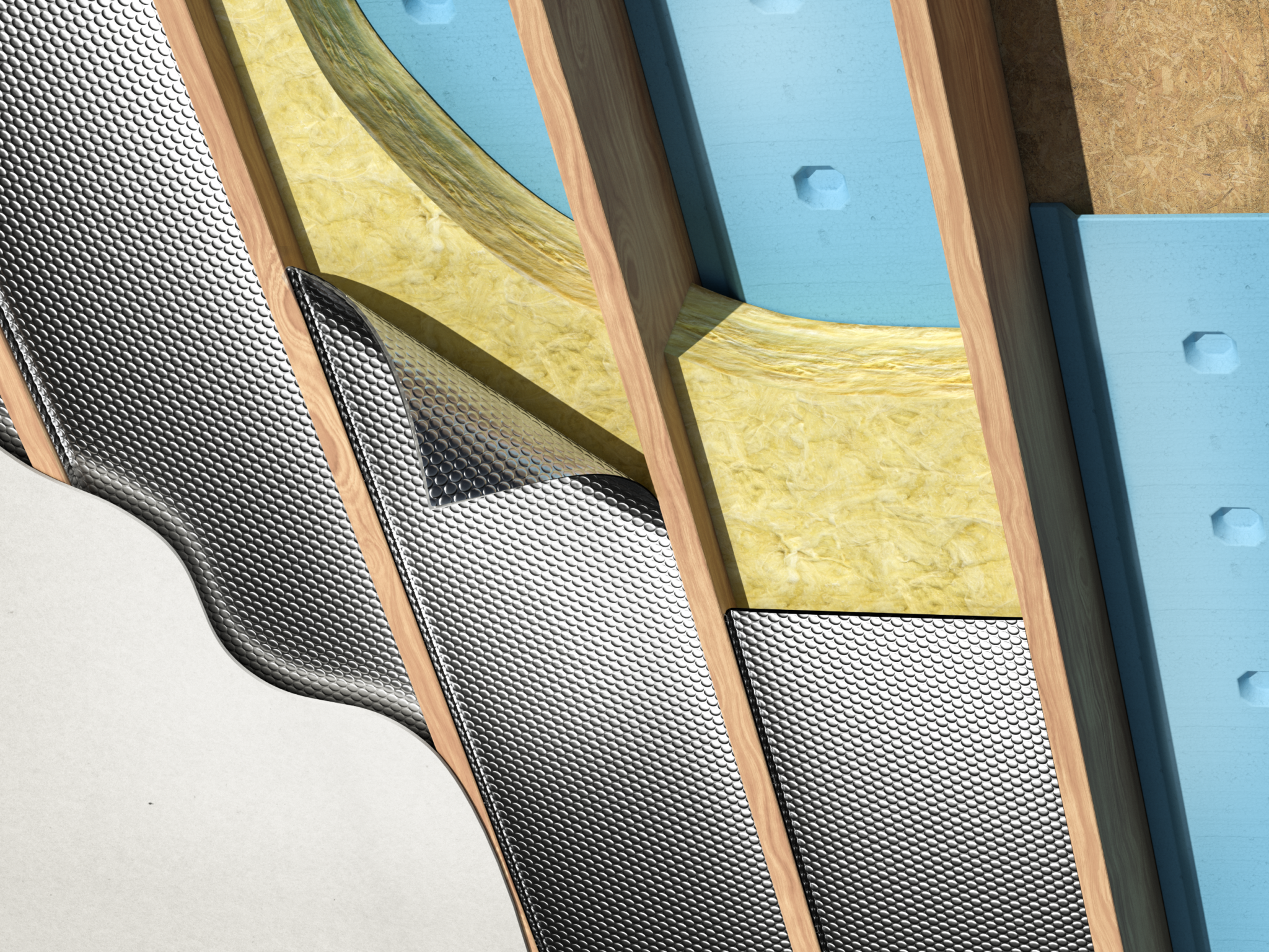 Reflective insulation installed below mass insulation in a cathedral ceiling to reduce heat loss in cold climates