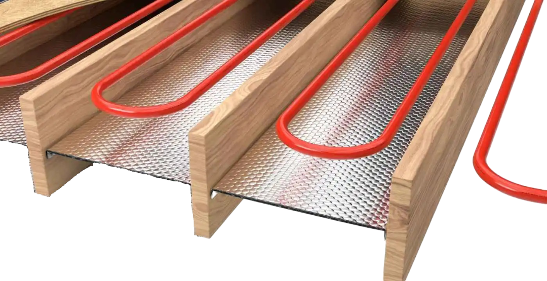 Reflective radiant floor insulation installed between floor joists under wood subfloor